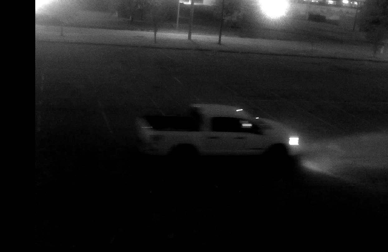 White pickup truck leaving the scene of the crime