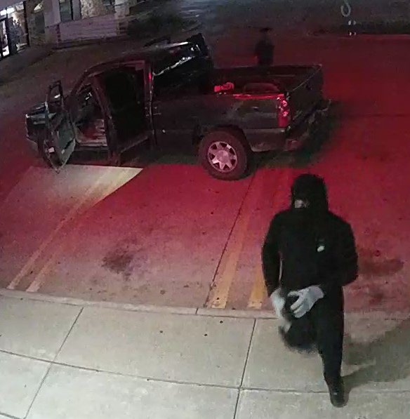 Suspect with mask leaving truck