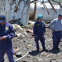 NRT members survey wreckage from a fire in West Texas