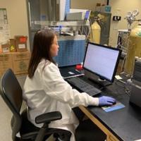 Dr. Lisa Gui-hua Lang reviews forensic analysis data in ATF'S Forensics Lab
