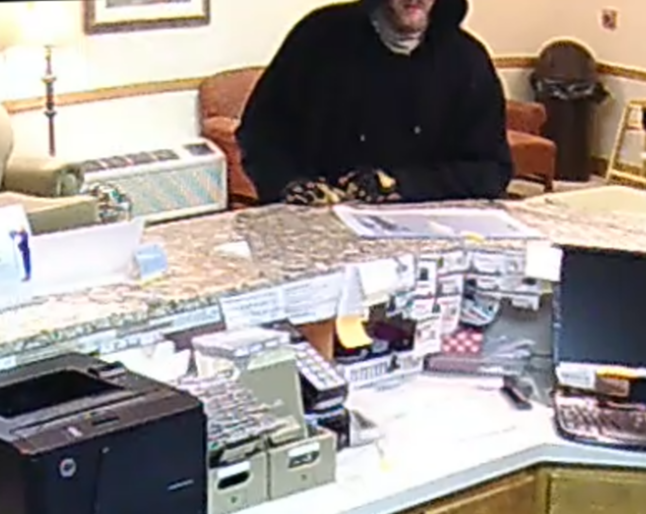 Image 1 of alleged suspect in robbery investigation.