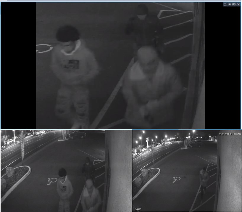 Four suspects, one masked, seen entering the FFL. 