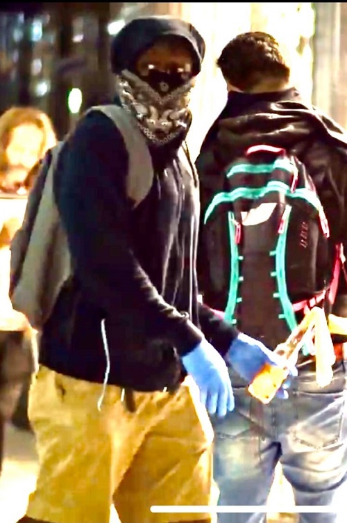 Men's Suit Outlet arson suspects.