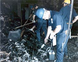 ATF agents sifting through the rubble of the Dupont Plaza Hotel