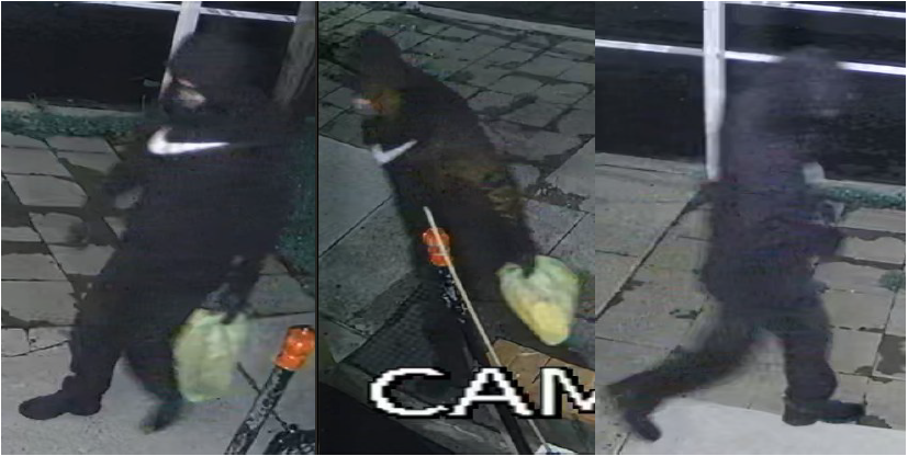 An individual in dark clothing seen at the incident scene