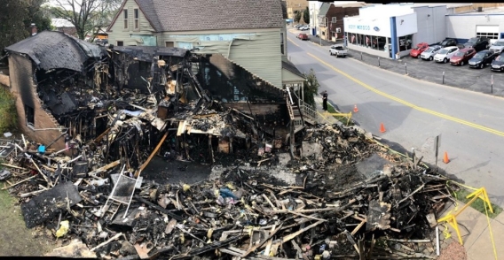 The rubble of an apartment building after a fire was extinguished