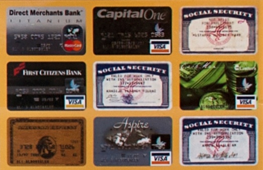 Image of credit cards and counterfeit social secuirty cards used by the defendants to make purchases and conceal their identities.