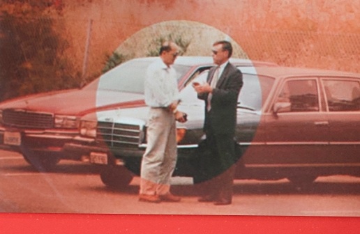 ATF Special Agent Richard Stoltz and one of Operation Dragonfire's principal defendants meet in a parking lot. 