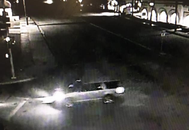 Image of the suspect's SUV captured on video surveillance footage.