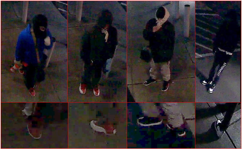 Image of the suspects with their faces covered, wearing blue and black coats and a black ski mask.