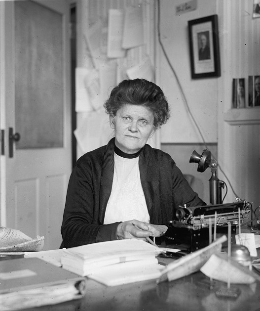 Prohibition Agent Georgia Hopley sits at her desk in Washington, D.C.