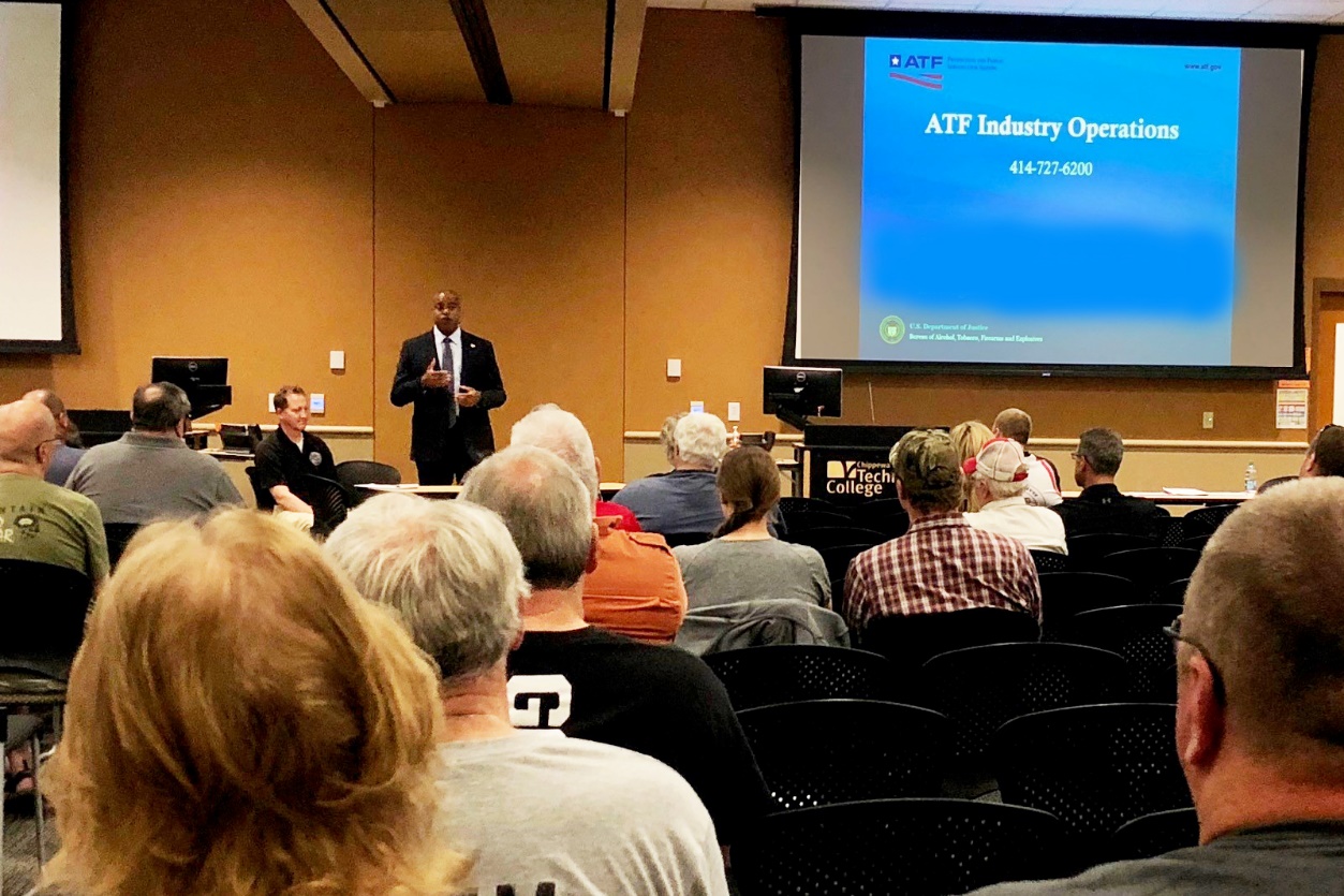 Assistant Special Agent in Charge Joel Lee, of the ATF St. Paul Field Division, welcomes federal firearms licensees to the ATF federal firearm licensee educational seminar held at the Chippewa Valley Technical College