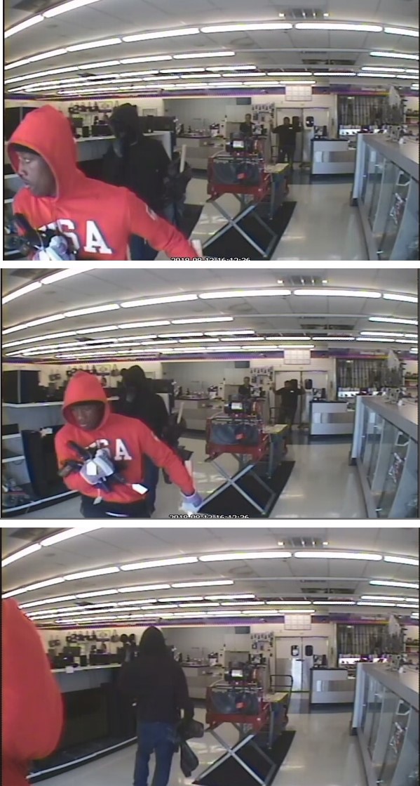 Image of two suspects robbing the American Pawn shop. 