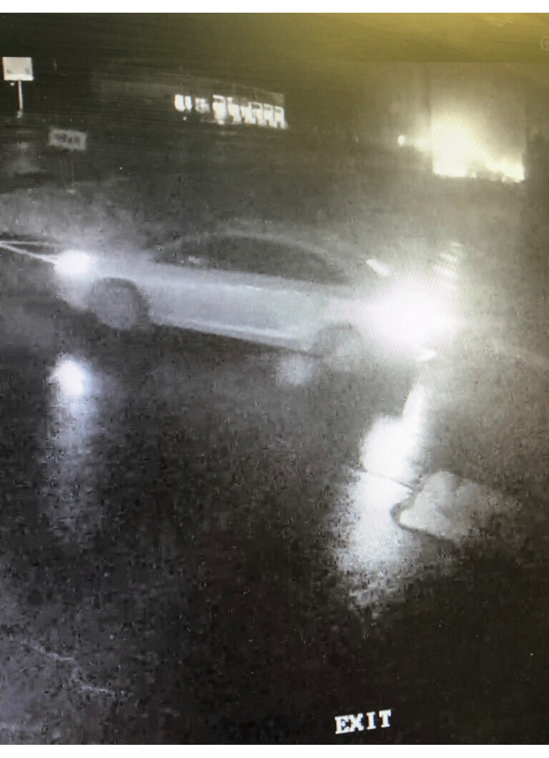 Image of a small light colored sedan used during the crime.