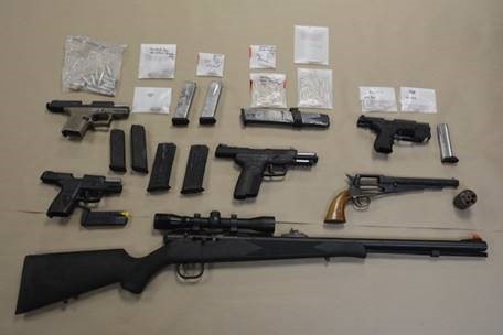 Seized guns, drugs and ammunition from investigation in Washington, DC.