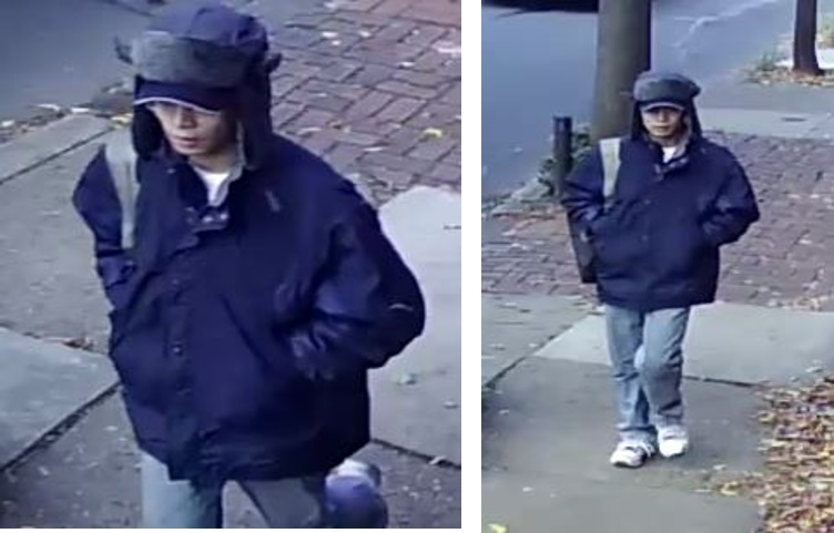 Suspect wearing a blue winter jacket, blue jeans and tennis shoes.