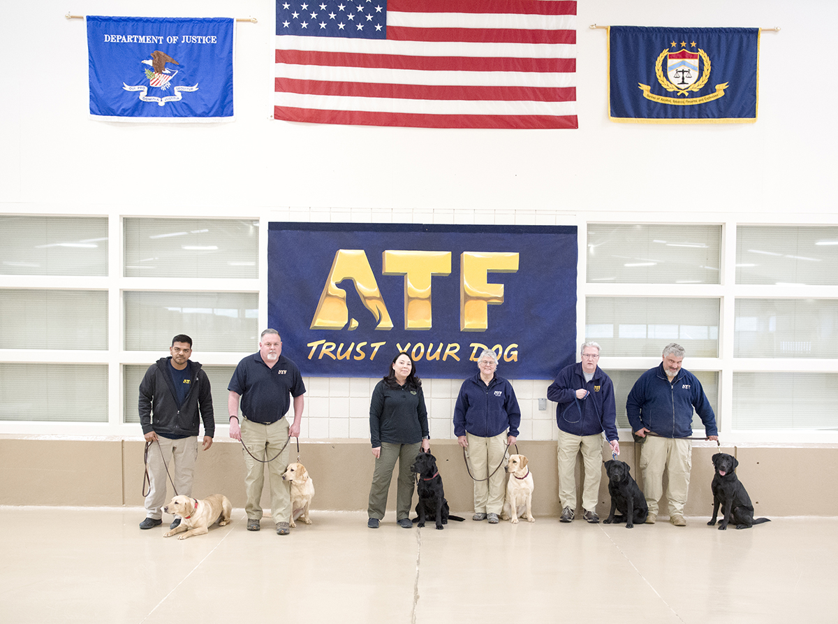 ATF National Canine Training Center Instructors Team and Special Agent Grace Reisling