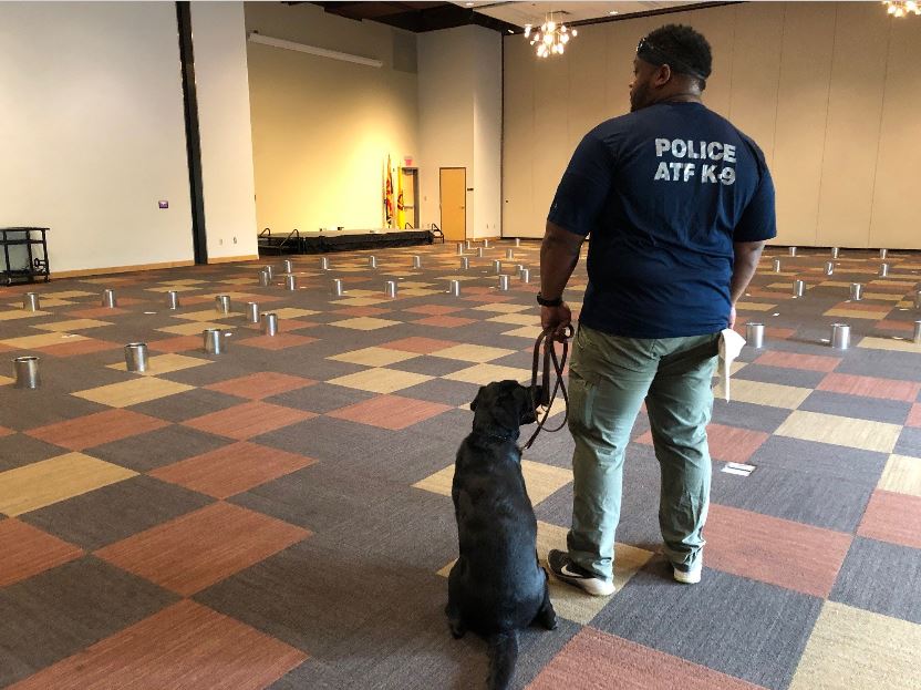 Special Agent Canine Handler and his K-9 prepare for training drills