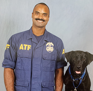 Special Agent Canine Handler Goodman and K-9 Haiku official portrait