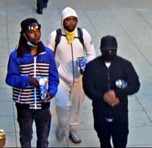 Suspect #2 wears a blue/black striped jacket, Suspect #3 a white hoodie and Suspect #4 a black outfit.