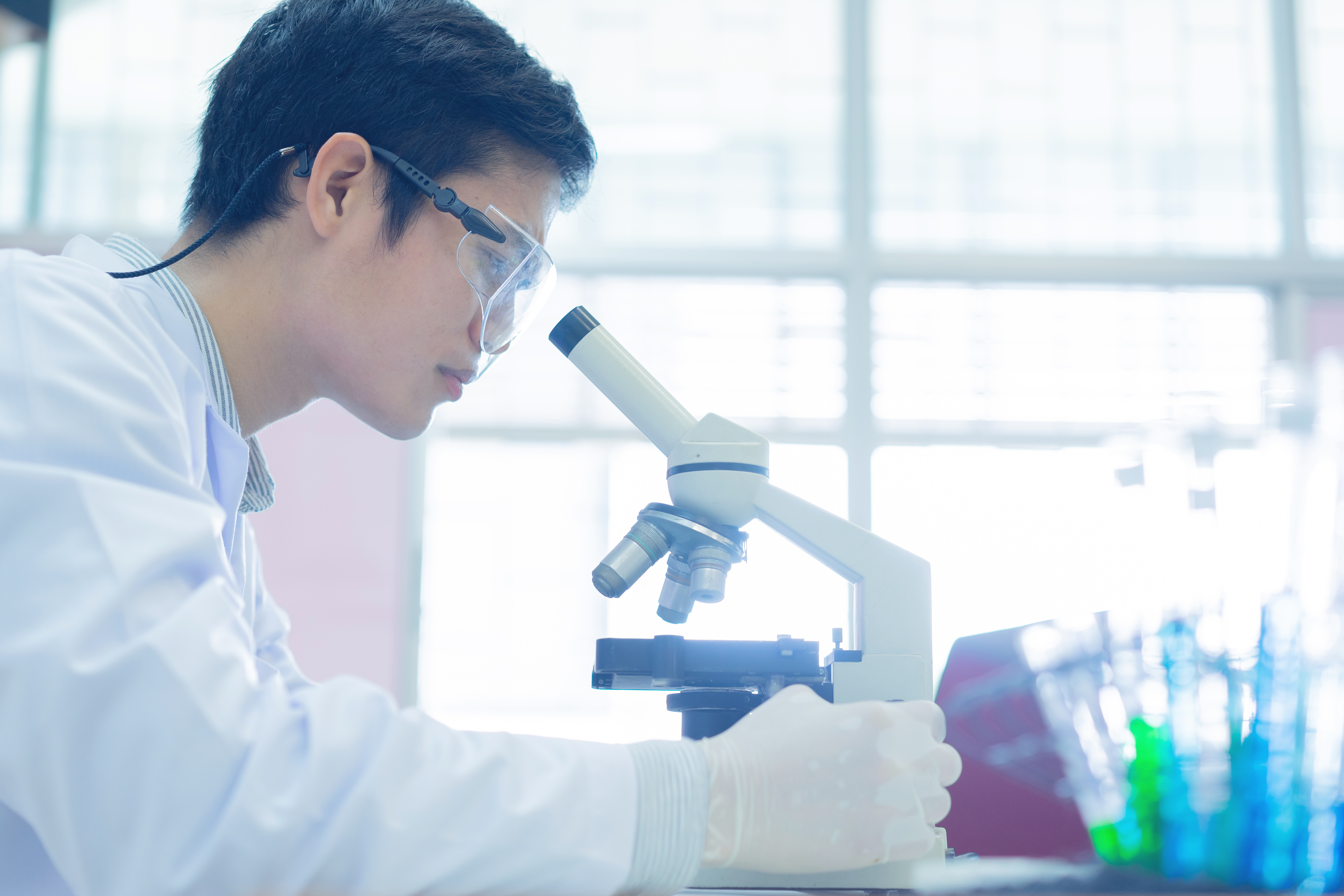 A forensic biologist works in the lab 