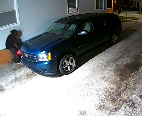 A parked car in the driveway