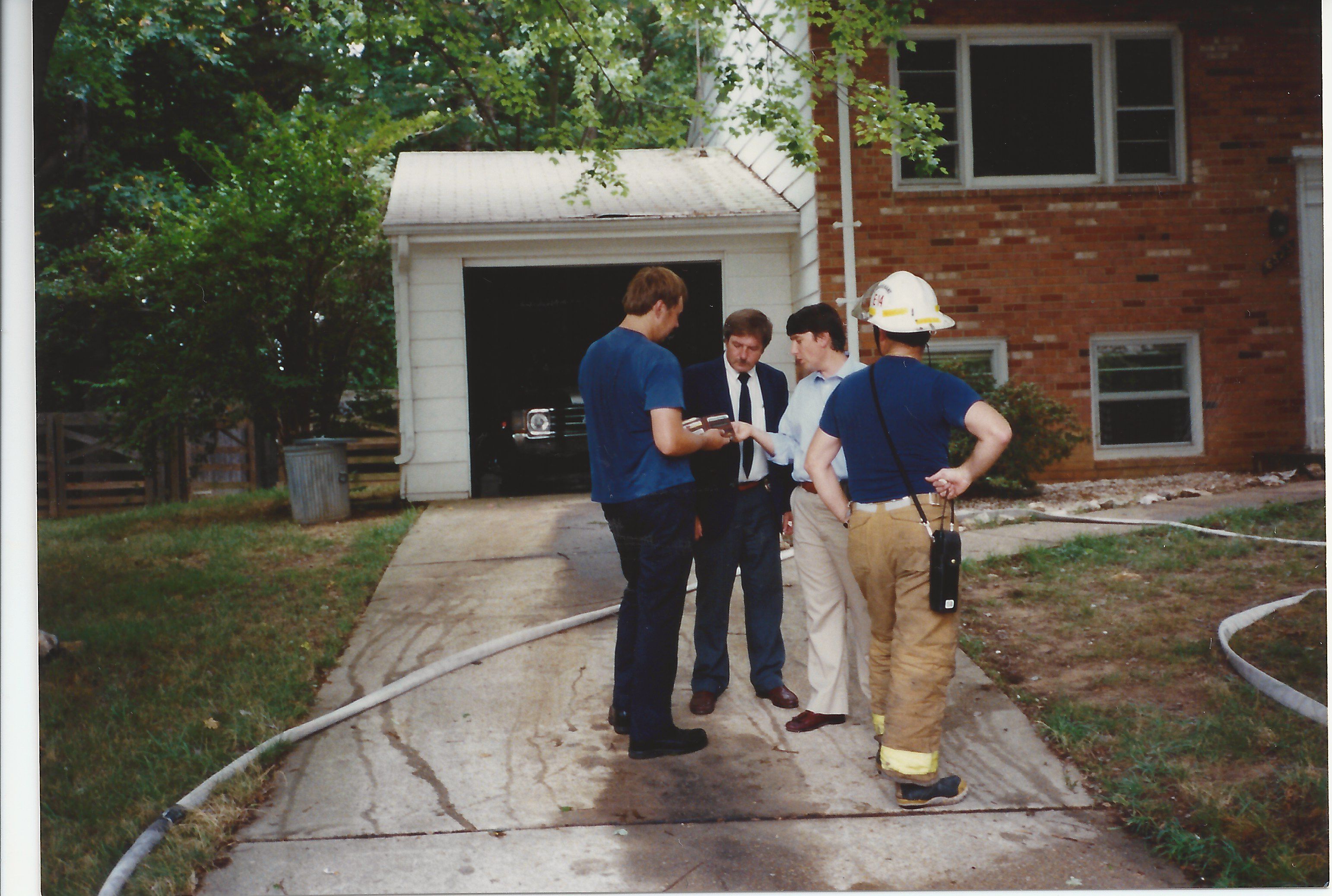  Joseph Bertoni works with local fire investigators at an incident
