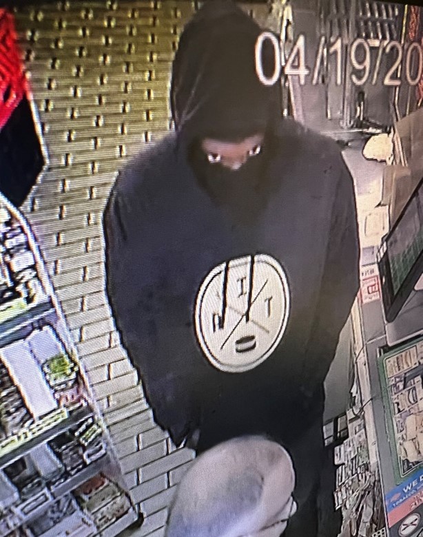 Suspect in black hoodie