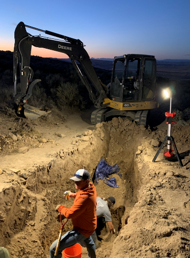 Special Agents with Homeland Security Investigations working with Washington State Police to exhume remains on September 13, 2023.