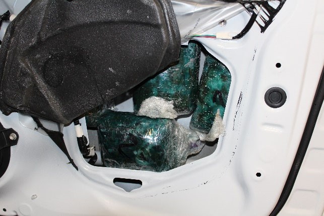 Vehicle compartment containing Methamphetamine.