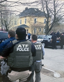 Agents with vests working the Boston Marathon bombing scene