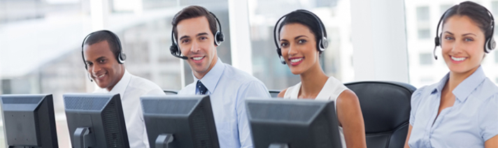People in a call center with headphones on