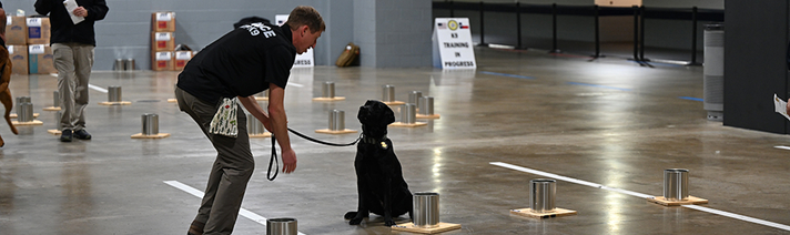 ATF Canine Handler training his canine at the National Canine Training Center