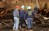 ATF agents sift through the remnants of an explosion