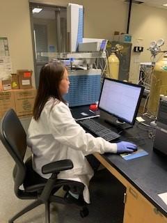 Dr. Lisa Gui-hua Lang reviews forensic analysis data in ATF's forensics lab
