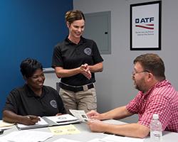 Industry Operations Investigator holds federal firearms licensee outreach class