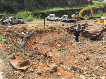 International response team processes the blast crater at fatal explosion scene at Virgin Islands