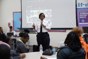A police chief talking to students in a class