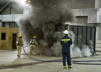 Fire researchers doing test fires