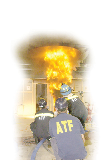 ATF Fire Fighters at a burn scene