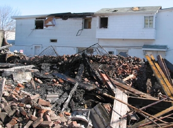 Debris from a house explosion caused by an illegal explosive