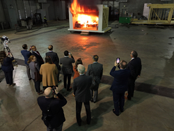 People observing an arson training