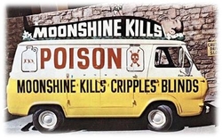 Van painted black, white and yellow advertising moonshine kills, poison, and moonshine kills, cripples, blinds.