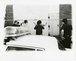 Special agents arresting a suspect
