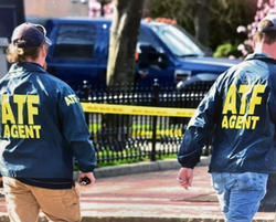 Two special agents walking at the Boston Marathon scene