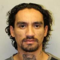 Image of wanted felon Justin Joshua Waiki
