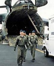 A C-5A military transport and the Northeast National Response Team investigation vehicle.