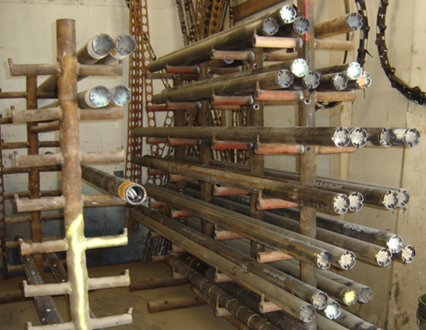 Jet perforating guns used to pierce oil and gas wells in preparation for production operations