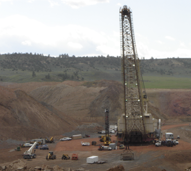A mine site actively preparing to conduct blasting operations