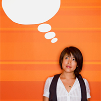 Women standing next to a question bubble. 